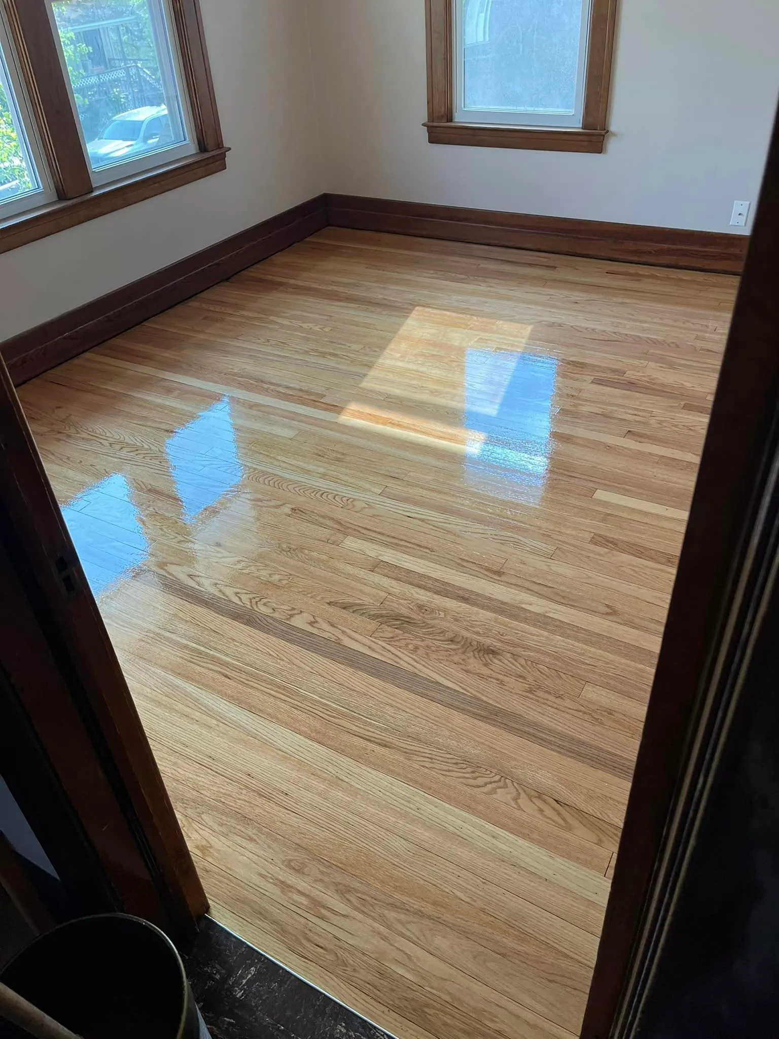 Freshly refinished hardwood floor by Kozlowski’s